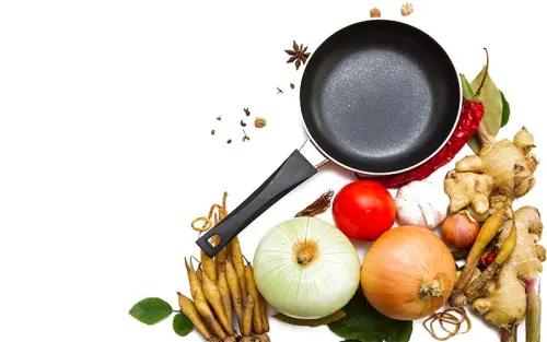 Fresh ingredients with frying pan